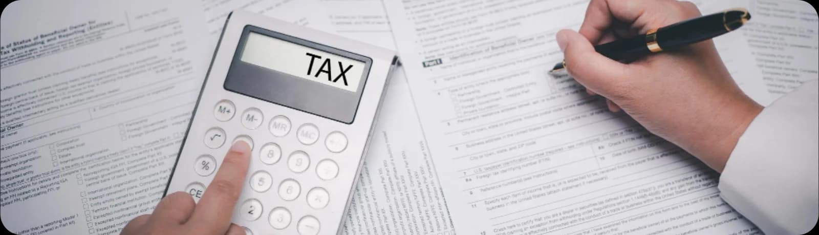 Tax Deductions - Hand calculating taxes on paper